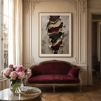 Luxurious living room with a red velvet sofa, floral arrangement, and framed artwork.